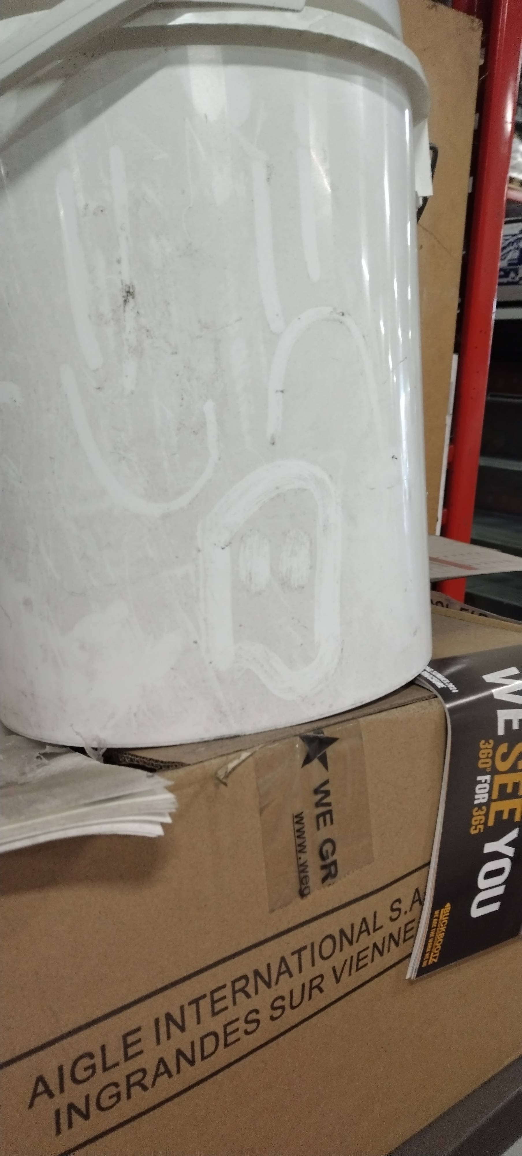 A White Bucket Covered In Dust A Ghost Is Drawn In The Dust